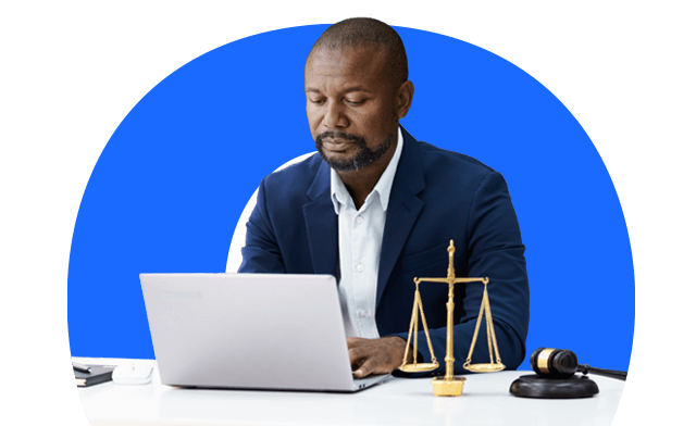 Lawyer typing on laptop