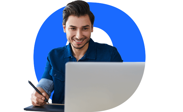 Smiling man doing file transfers on laptop