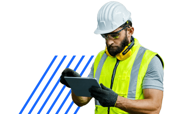 Man on worksite with a tablet