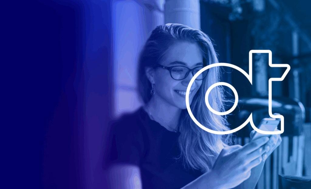 Happy customer looking at her phone